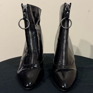 Black ankle boots with silver ring